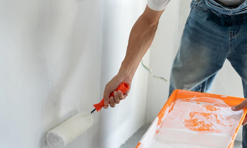 Painting interior wall with roller