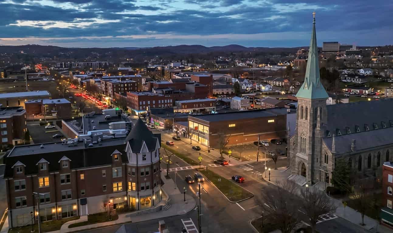Aerial dusk view of a downtown city street